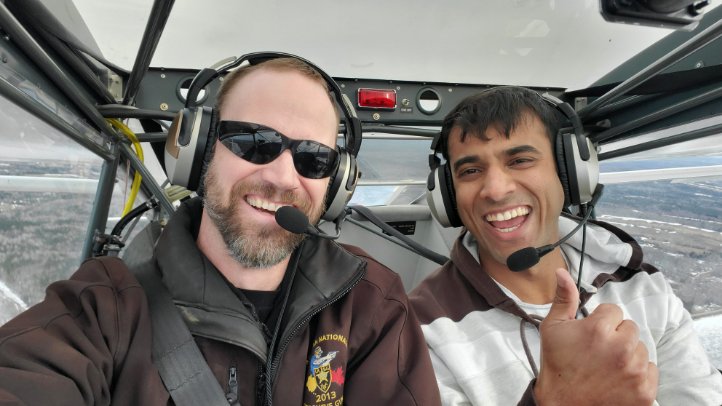 Experienced Power Hang Glider Pilots at Whistler Sky Sports with safety briefing